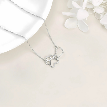 Siarah - Silver paw necklace with heart-shaped crystal pendant