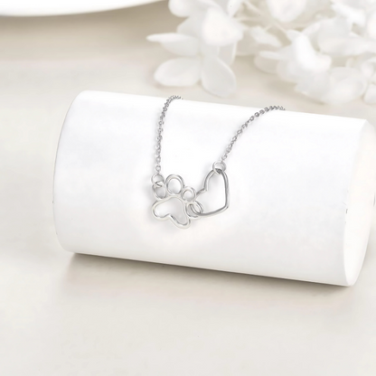 Siarah - Silver paw necklace with heart-shaped crystal pendant