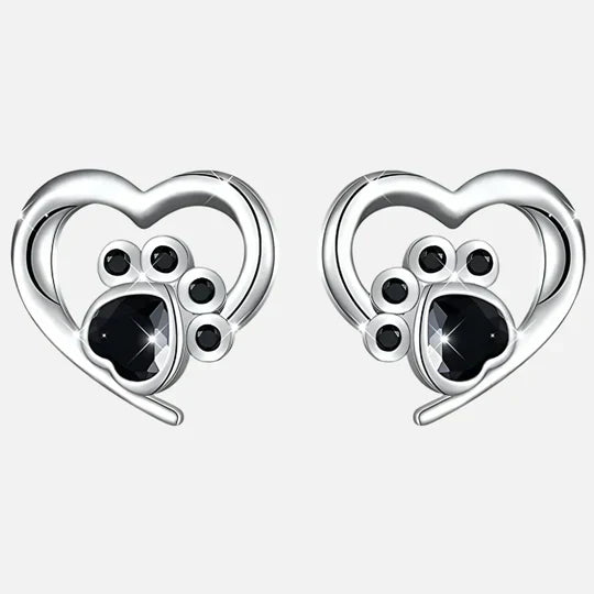 Nina - cardiac paw earpluged with black silver