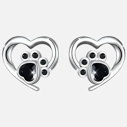 Nina - cardiac paw earpluged with black silver